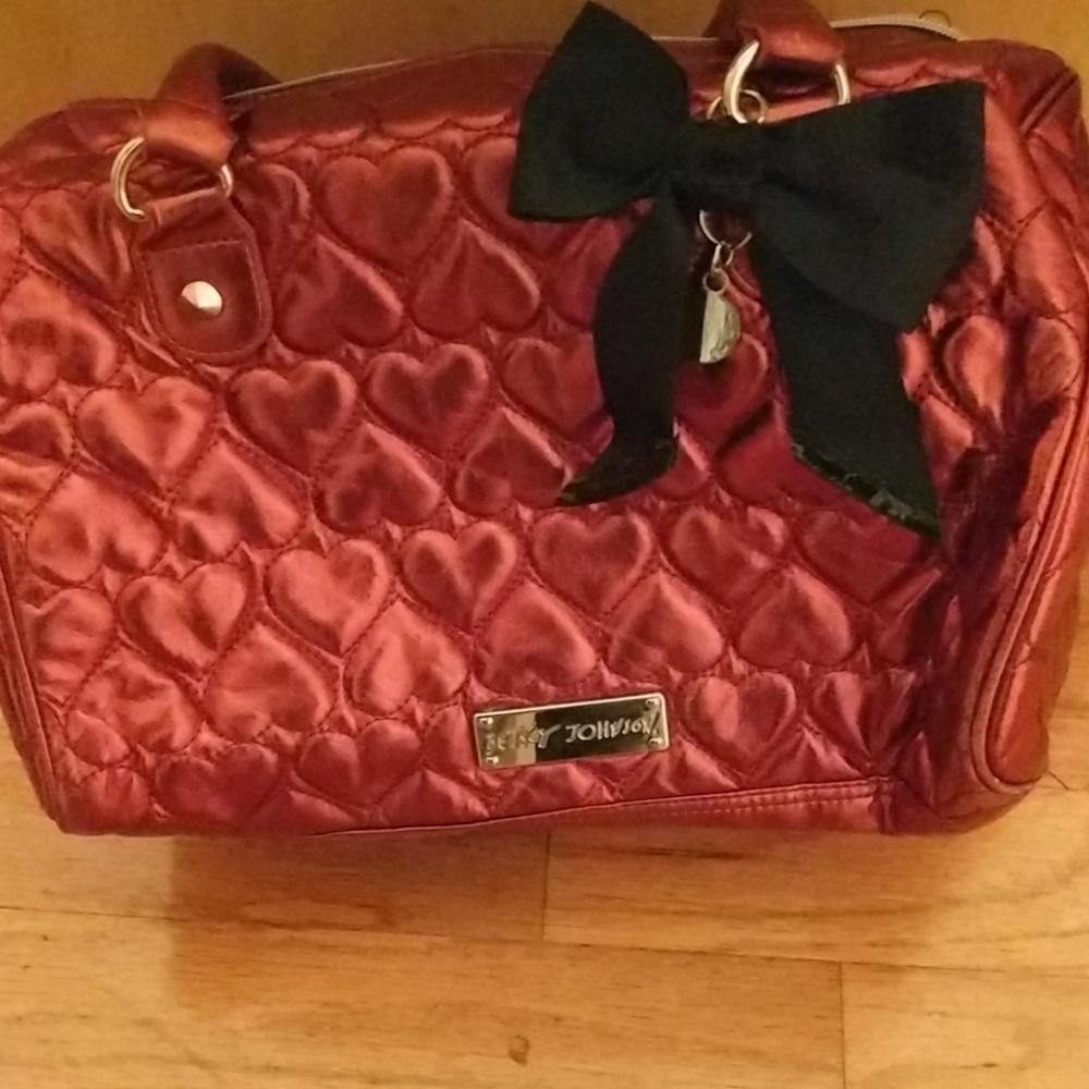 Betsey Johnson Burgundy purse... slightly used...